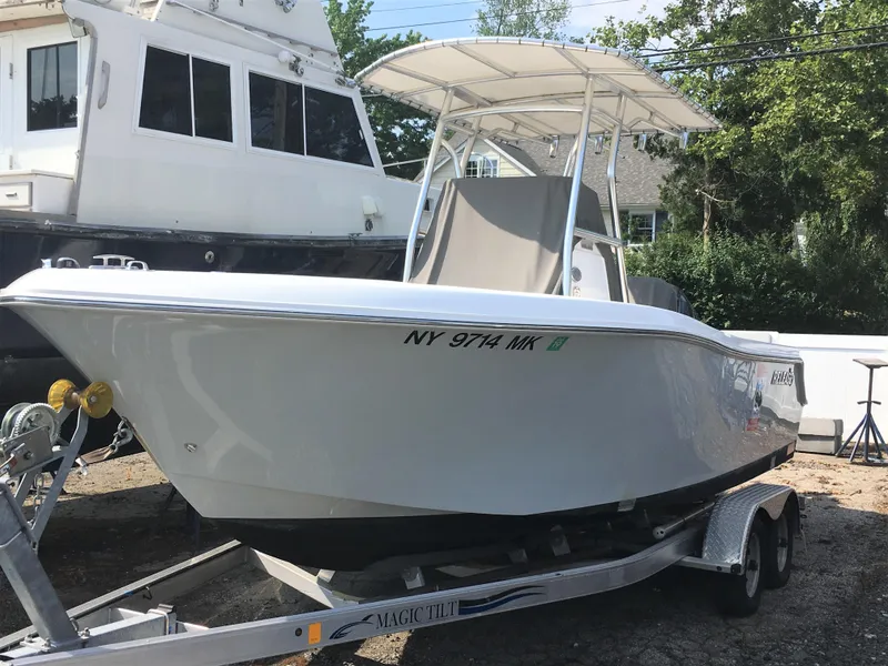 Slide: The Image of 2016 Release 208 RX boat on trailer, side view. - 1