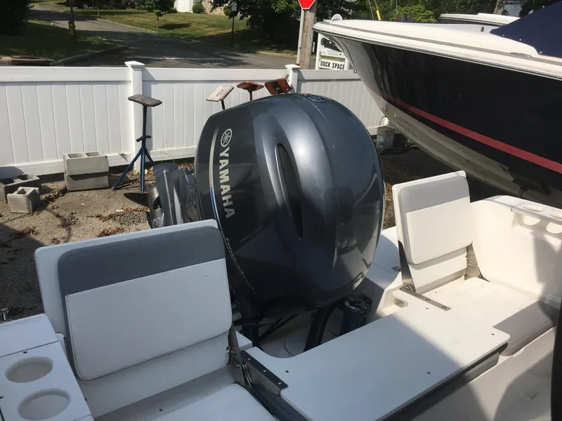 Slide: The Image of Yamaha outboard motor on a 2016 Release 208 RX boat. - 10