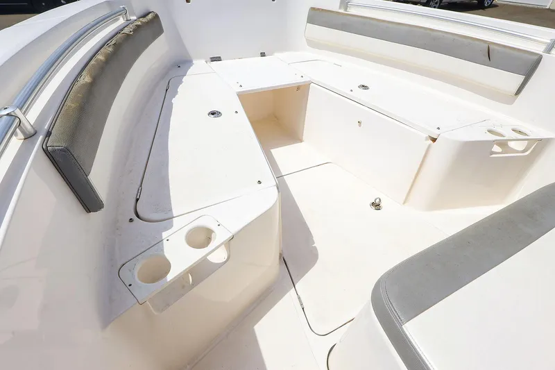 Slide: The Image of Spacious interior of 2016 Release 208 RX boat with seating and cup holders. - 17
