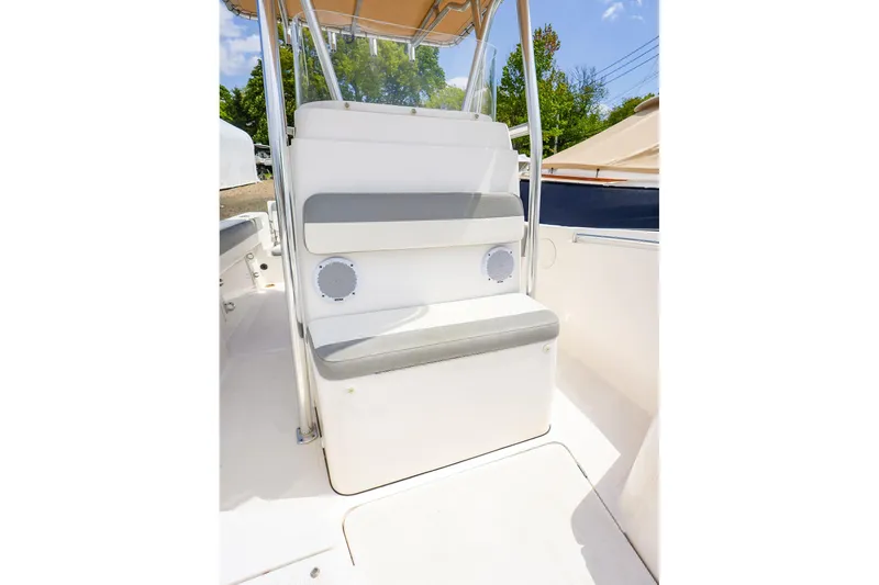 Slide: The Image of 2016 Release 208 RX boat interior with cushioned seating and speaker system. - 18