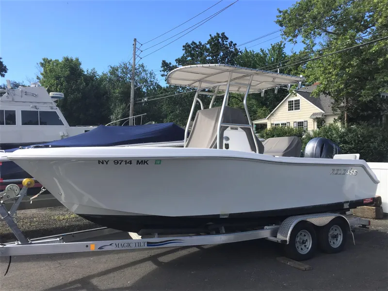 Slide: The Image of 2016 Release 208 RX boat on trailer, side view. - 3