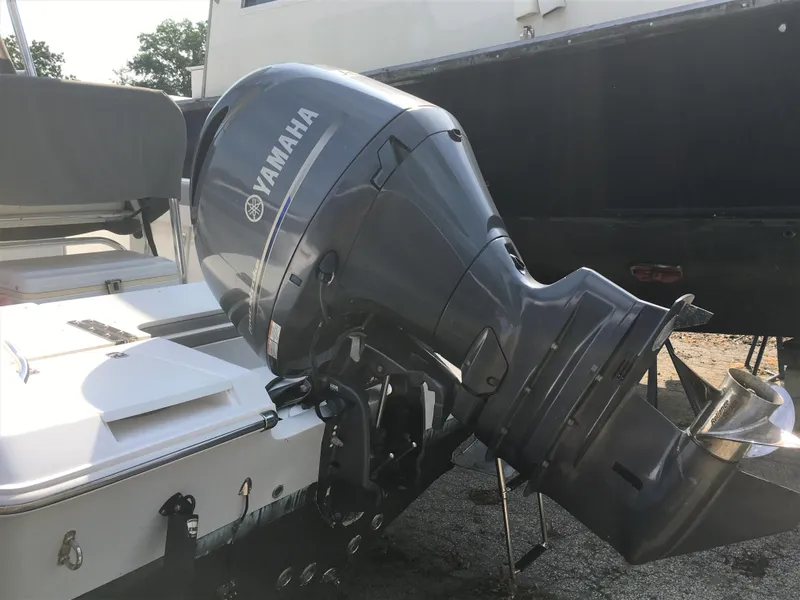 Slide: The Image of Yamaha outboard motor on a 2016 Release 208 RX boat. - 9