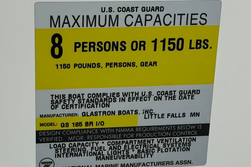 Slide: The Image of 1997 Glastron GS 185 capacity label: 8 persons or 1150 lbs, U.S. Coast Guard compliant. - 24