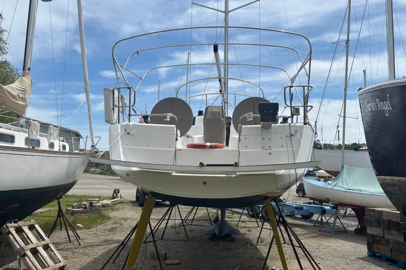 Slide: The Image of 2017 Jeanneau Sun Odyssey 389 sailboat on stands in a boatyard. - 20