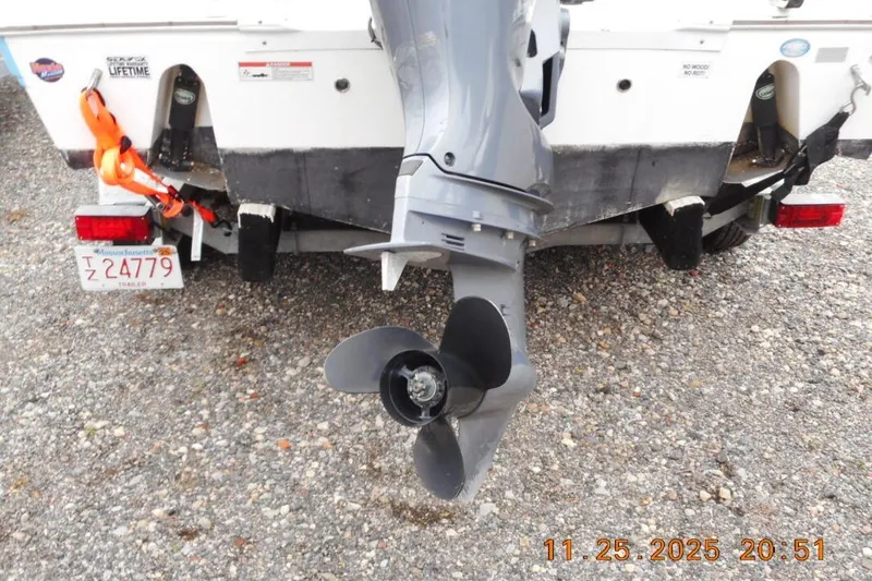 Slide: The Image of Rear view of a 2021 Sea Fox 228 Commander boat with Massachusetts trailer plate. - 6