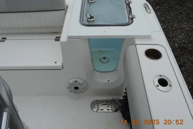Slide: The Image of 2021 Sea Fox 228 Commander boat interior with storage compartments and speaker. - 9