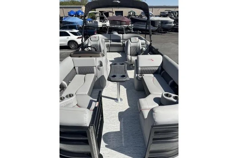 Slide: The Image of 2022 Bennington 22 LSR pontoon boat with spacious seating and modern design. - 6