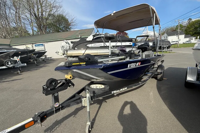 Slide: The Image of 2019 Bass Tracker Pro 17 boat with canopy on trailer in parking lot. - 5