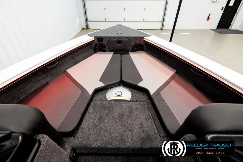 Slide: The Image of 2026 Lund 1875 Crossover XS boat interior with sleek seating and modern design. - 13