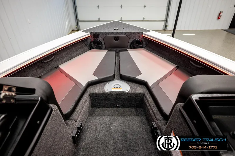 Slide: The Image of Interior view of 2026 Lund 1875 Crossover XS boat with sleek seating and modern design. - 24