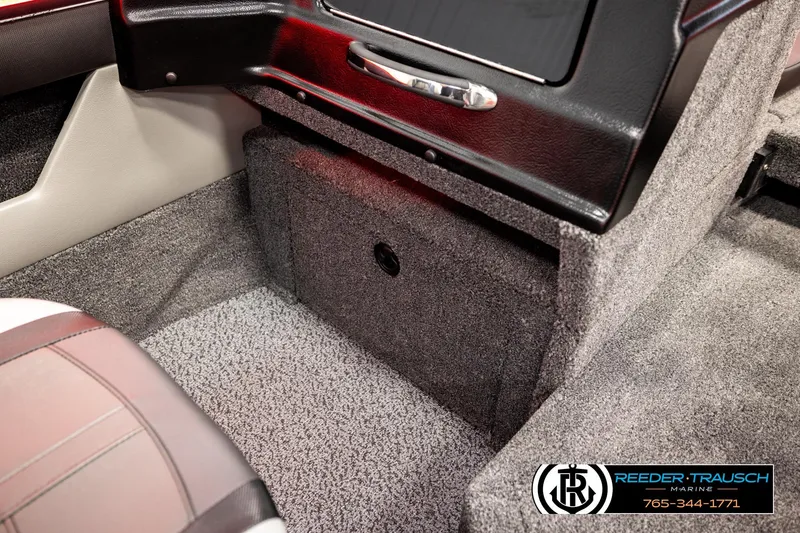 Slide: The Image of Interior of 2026 Lund 1875 Crossover XS boat with carpeted storage compartment. - 30