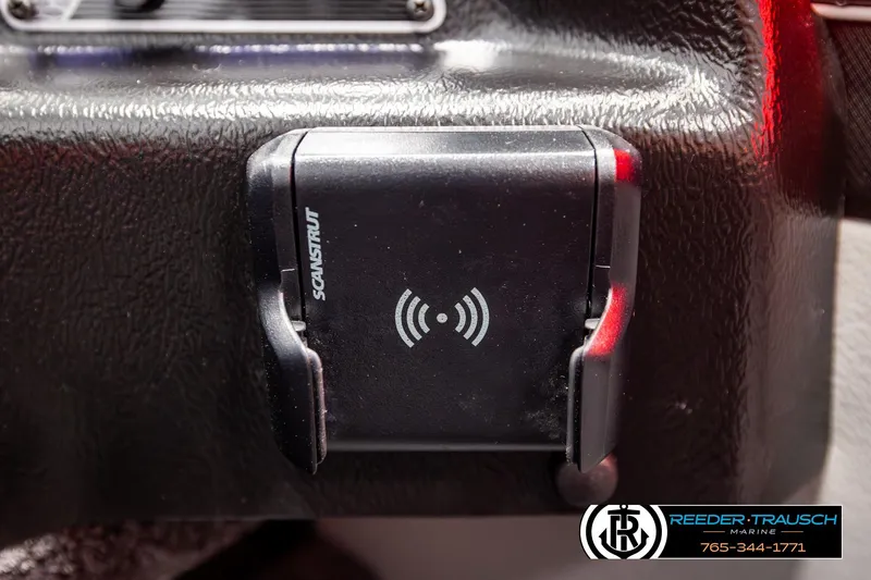 Slide: The Image of Wireless charging mount in 2026 Lund 1875 Crossover XS boat dashboard. - 42