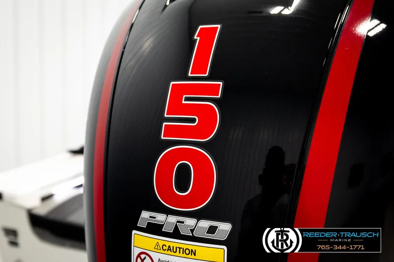 Slide: The Image of Close-up of 2026 Lund 1875 Crossover XS engine with '150 Pro' label. - 54
