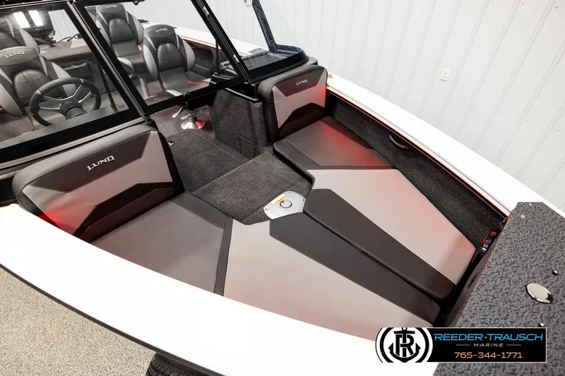 Slide: The Image of 2026 Lund 1875 Crossover XS boat interior with sleek seating and modern design. - 7