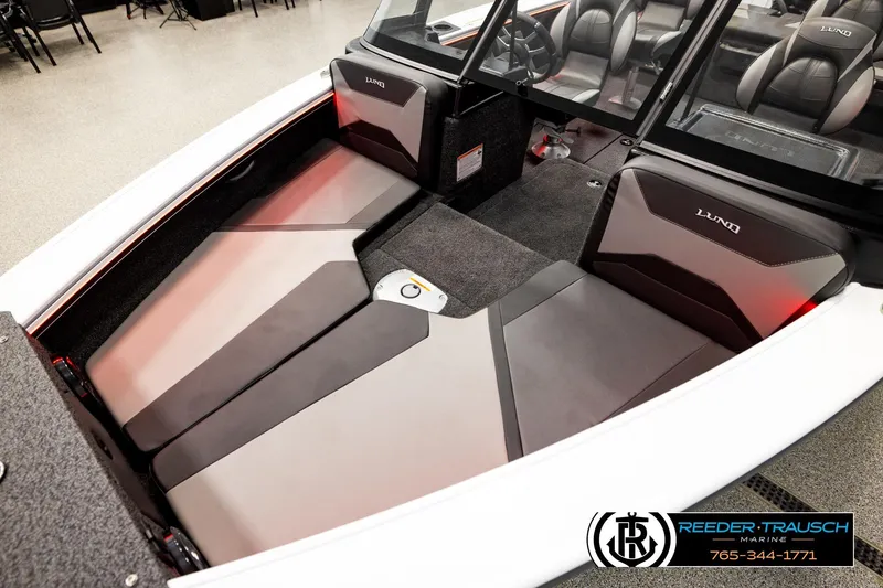 Slide: The Image of 2026 Lund 1875 Crossover XS boat interior with sleek seating and modern design. - 8