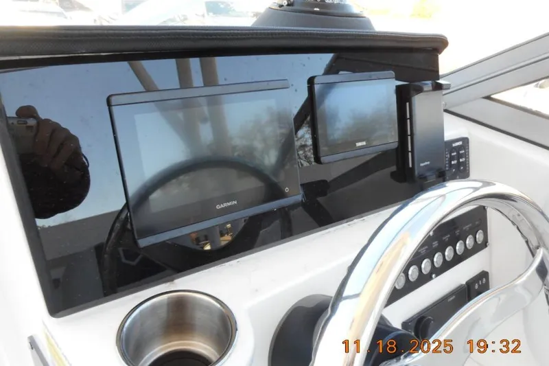 Slide: The Image of Dashboard of 2026 Sea Fox 228 Traveler boat with Garmin and Yamaha displays. - 10