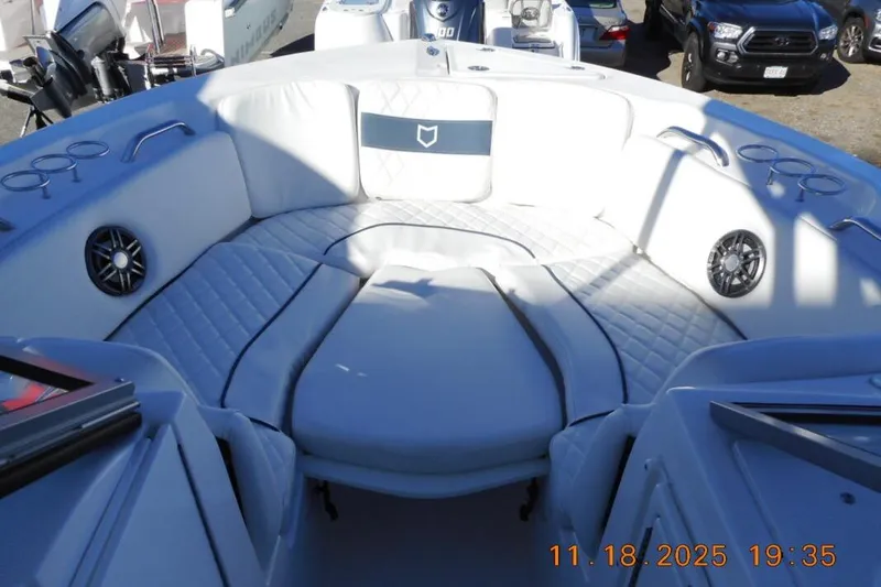 Slide: The Image of Interior view of 2026 Sea Fox 228 Traveler boat with cushioned seating. - 13