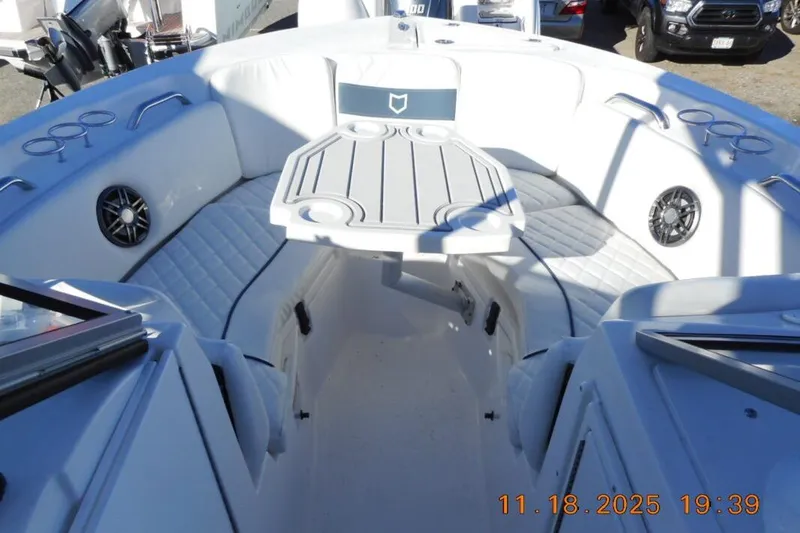 Slide: The Image of Interior view of 2026 Sea Fox 228 Traveler boat with seating and table. - 15