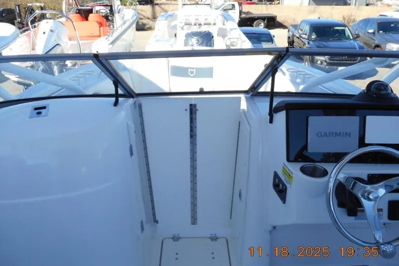 Slide: The Image of 2026 Sea Fox 228 Traveler boat dashboard with Garmin navigation system. - 16