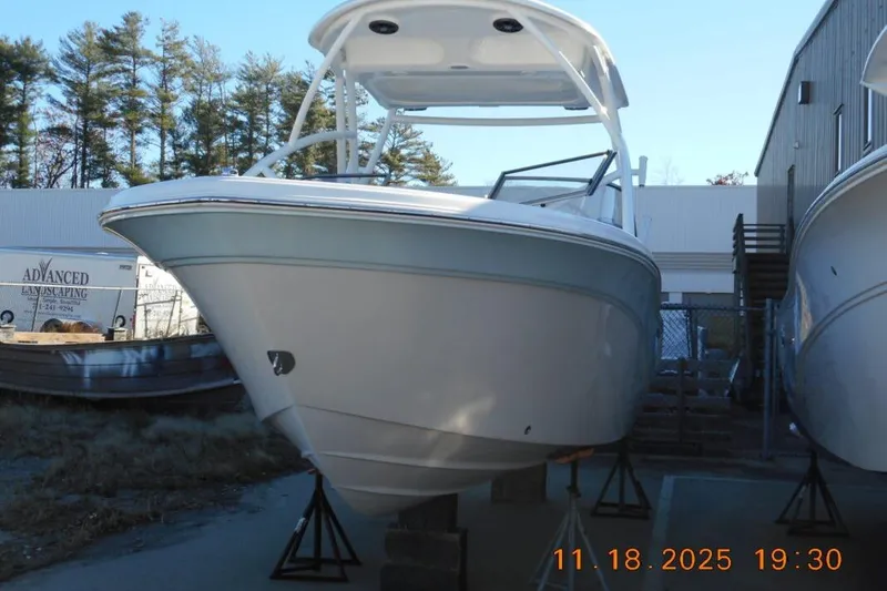 Slide: The Image of 2026 Sea Fox 228 Traveler boat on display outdoors. - 4