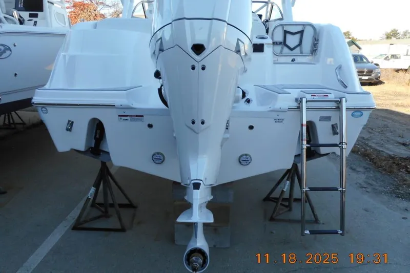Slide: The Image of 2026 Sea Fox 228 Traveler boat rear view with ladder and outboard motor. - 7