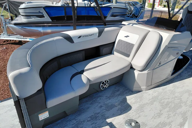 Slide: The Image of 2026 Starcraft SLS 3 Q DH boat interior with modern seating design. - 10