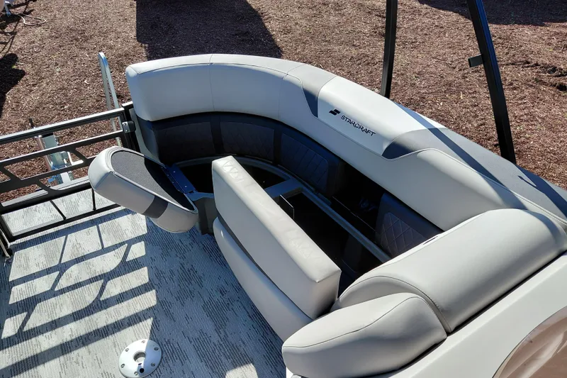 Slide: The Image of 2026 Starcraft SLS 3 Q DH boat interior with luxurious seating and modern design. - 14