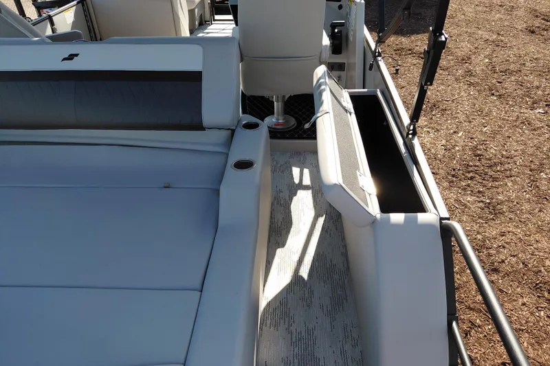 Slide: The Image of 2026 Starcraft SLS 3 Q DH boat interior with seating and storage compartments. - 29