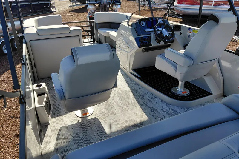 Slide: The Image of Interior of 2026 Starcraft SLS 3 Q DH boat with modern seating and helm. - 32