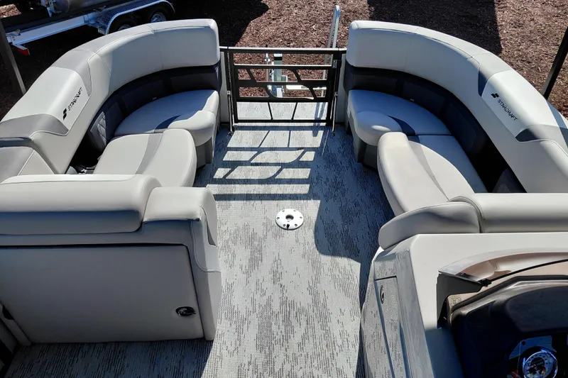 Slide: The Image of 2026 Starcraft SLS 3 Q DH pontoon boat interior with plush seating and modern design. - 33