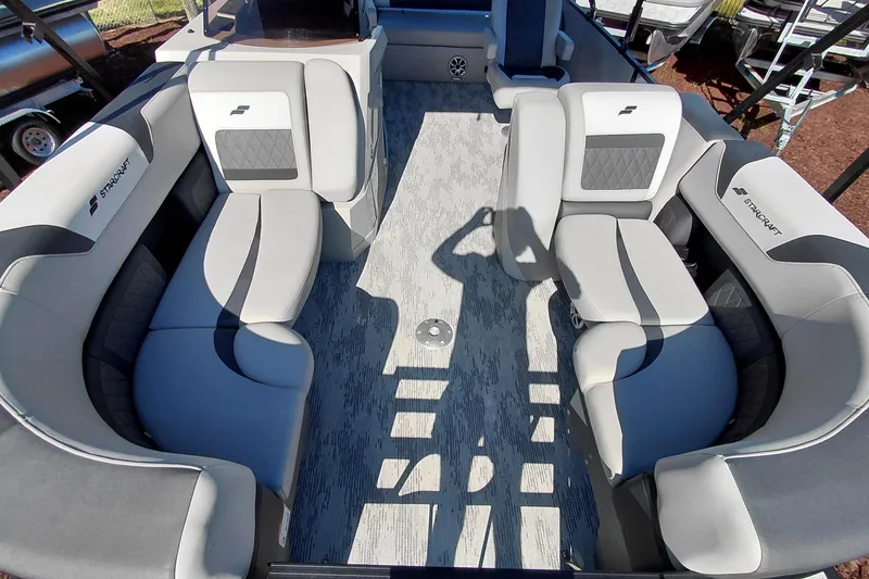 Slide: The Image of Luxurious interior of 2026 Starcraft SLS 3 Q DH pontoon boat with plush seating. - 9
