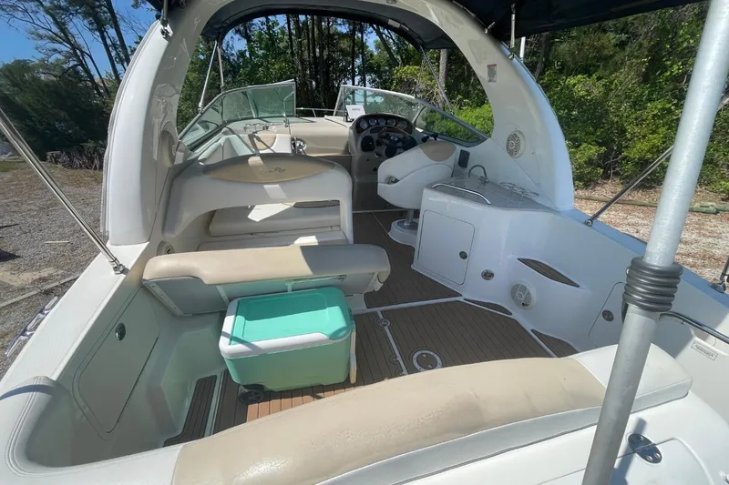 Slide: The Image of 2008 Sea Ray Sundancer 280 interior with seating, helm, and outdoor amenities. - 10