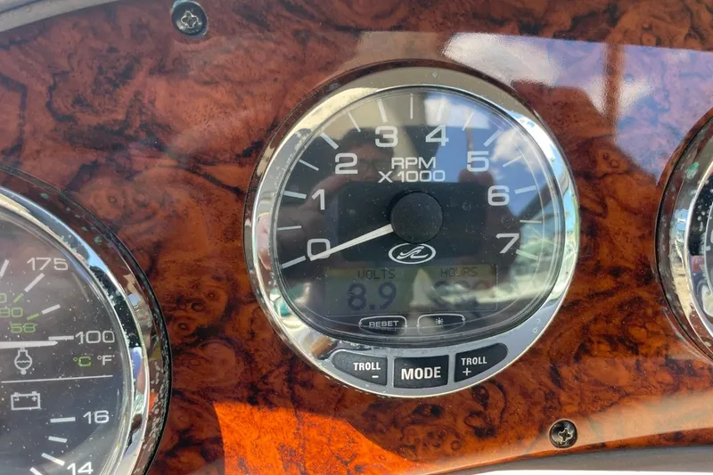 Slide: The Image of Close-up of 2008 Sea Ray Sundancer 280 RPM gauge on wooden dashboard. - 27