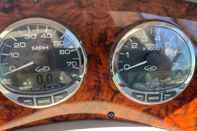 Slide: The Image of Dashboard of a 2008 Sea Ray Sundancer 280 showing speedometer and tachometer. - 28