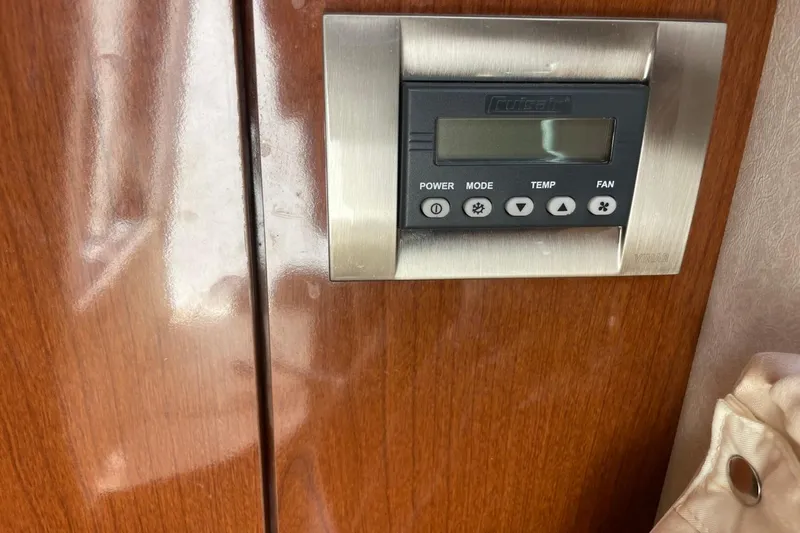 Slide: The Image of Digital control panel on 2008 Sea Ray Sundancer 280 yacht interior. - 43