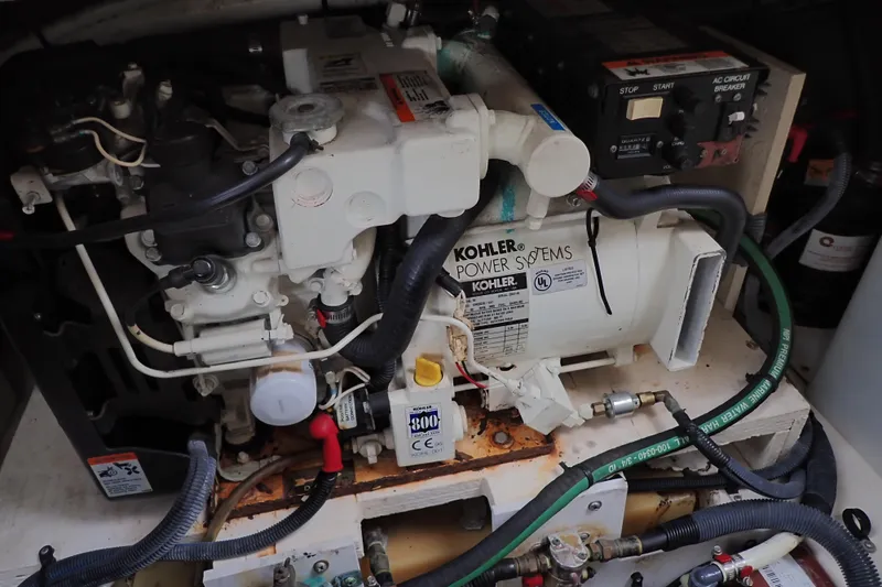 Slide: The Image of Engine compartment of a 2005 Sea Ray Sundancer 260 with Kohler power systems. - 110