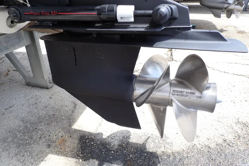 Slide: The Image of Close-up of a 2005 Sea Ray Sundancer 260 boat propeller and power trim system. - 120