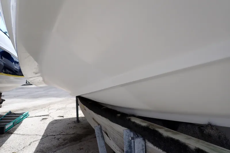 Slide: The Image of Close-up of 2005 Sea Ray Sundancer 260 hull on a trailer. - 130