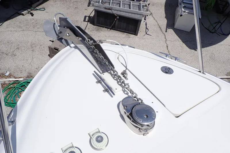 Slide: The Image of Bow of 2005 Sea Ray Sundancer 260 with anchor chain and winch system. - 22