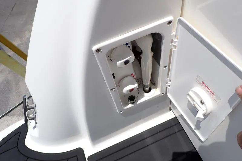Slide: The Image of 2005 Sea Ray Sundancer 260 boat shower controls and compartment detail. - 31