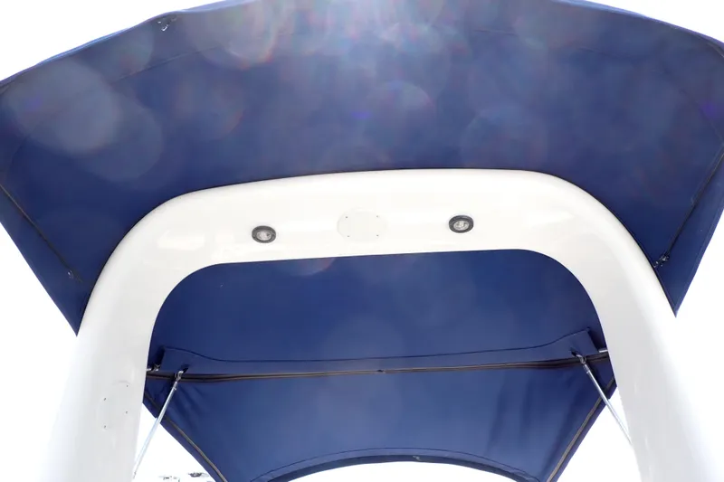 Slide: The Image of Blue canopy of a 2005 Sea Ray Sundancer 260 boat, viewed from below. - 53