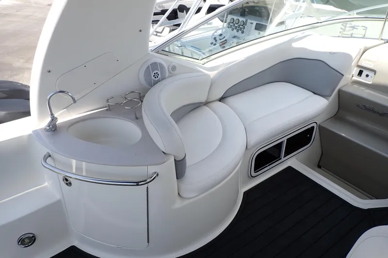Slide: The Image of Interior of 2005 Sea Ray Sundancer 260 with seating and sink area. - 6