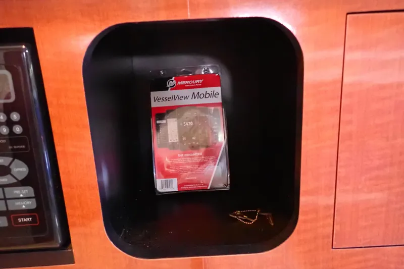 Slide: The Image of Mercury VesselView Mobile device in 2005 Sea Ray Sundancer 260 cabin compartment. - 61