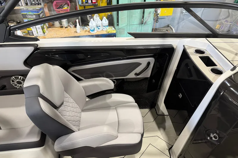Slide: The Image of Interior of 2025 Yamaha Boats 255XD, featuring a sleek seat and modern design elements. - 12