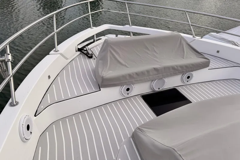 Slide: The Image of Azimut Verve 40 yacht deck, 2020 model, featuring sleek design and covered seating area. - 19