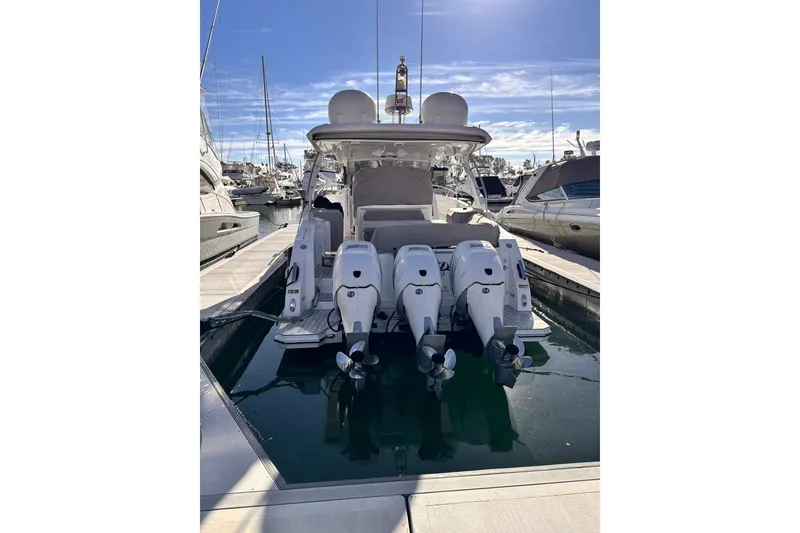 Slide: The Image of Azimut Verve 40 yacht, 2020 model, docked with triple outboard engines. - 2