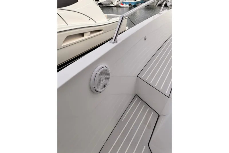 Slide: The Image of Azimut Verve 40 yacht deck with speaker, 2020 model, docked at marina. - 20