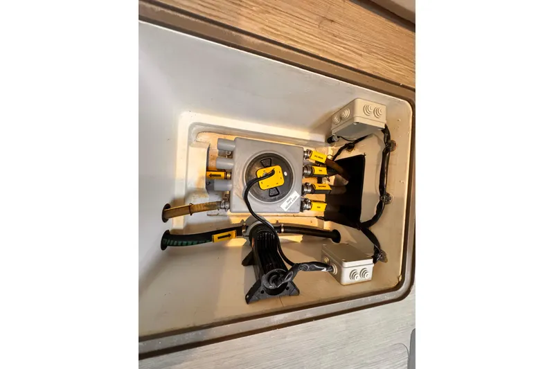 Slide: The Image of Electrical components inside a 2020 Azimut Verve 40 yacht, showcasing wiring and connections. - 33