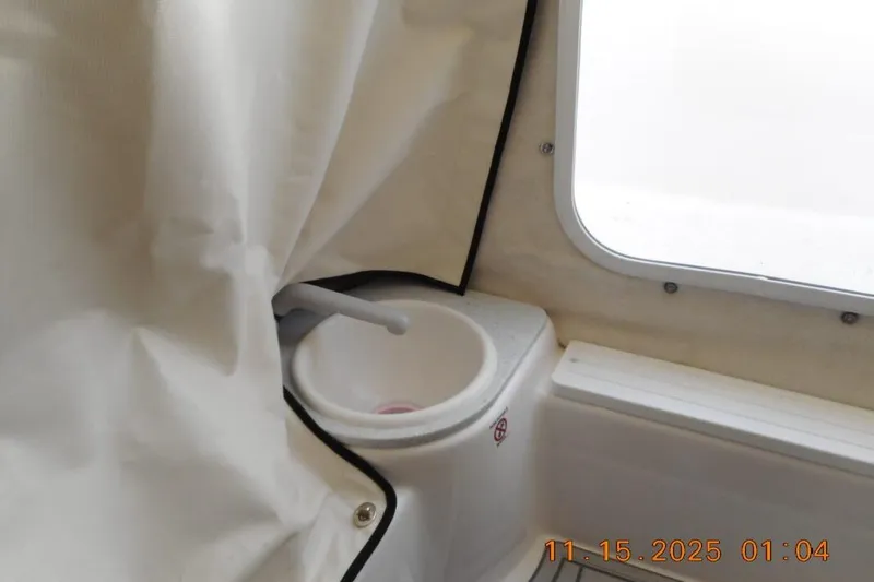 Slide: The Image of Interior view of Sea Fox 248 Side Console boat, featuring a compact sink area. - 11