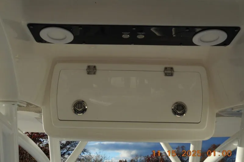 Slide: The Image of Overhead console of 2026 Sea Fox 248 Side Console boat with storage compartment. - 5